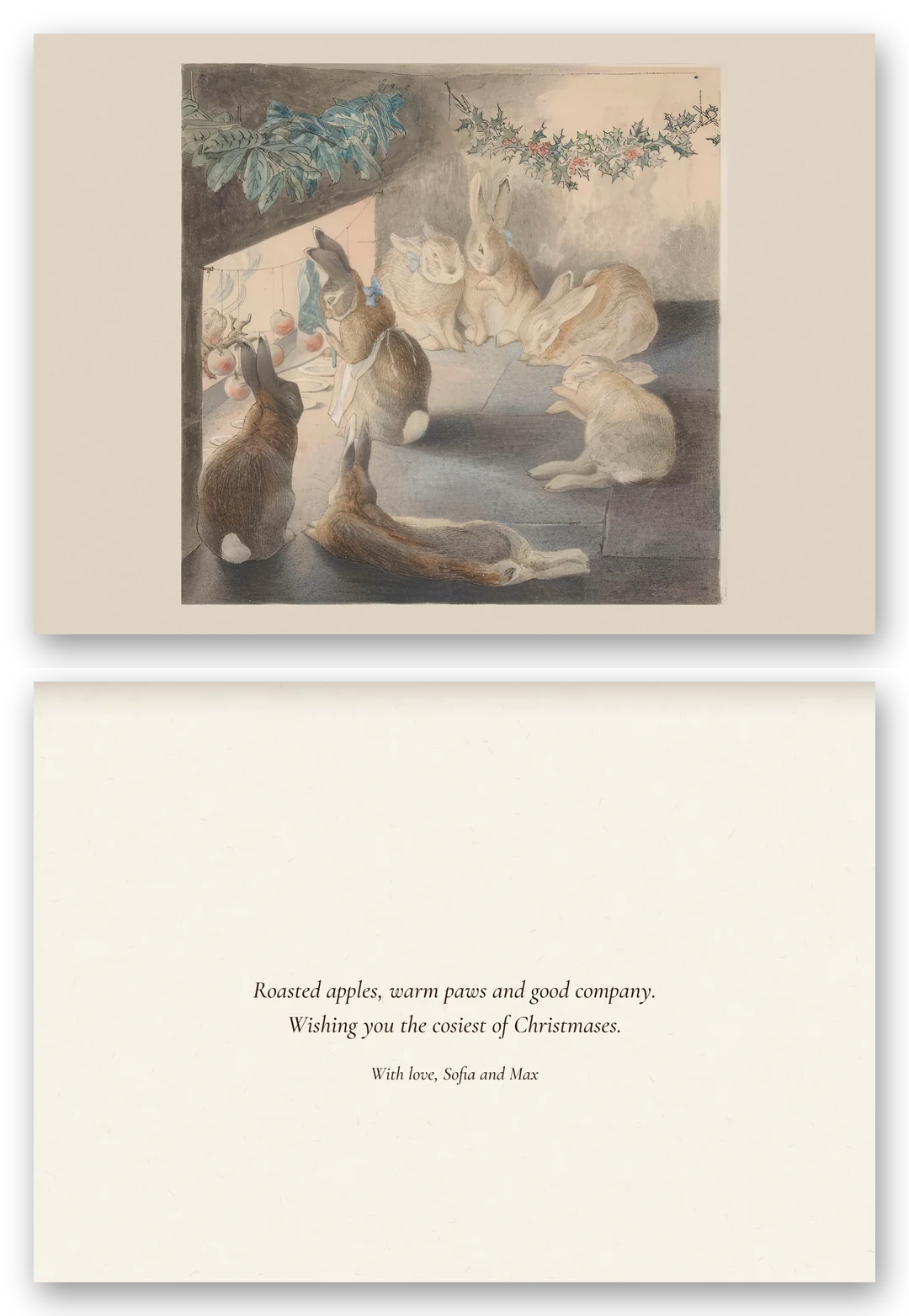 Beatrix Potter's watercolour of rabbits gathered by a fire roasting apples under a garland, above the open card and a warm message.